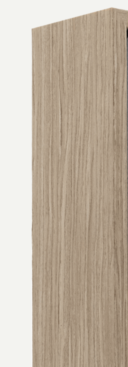 Close-up of a textured wooden panel showcasing natural grains in a light wood finish.
