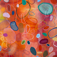 Abstract art with colorful shapes on a warm-toned background