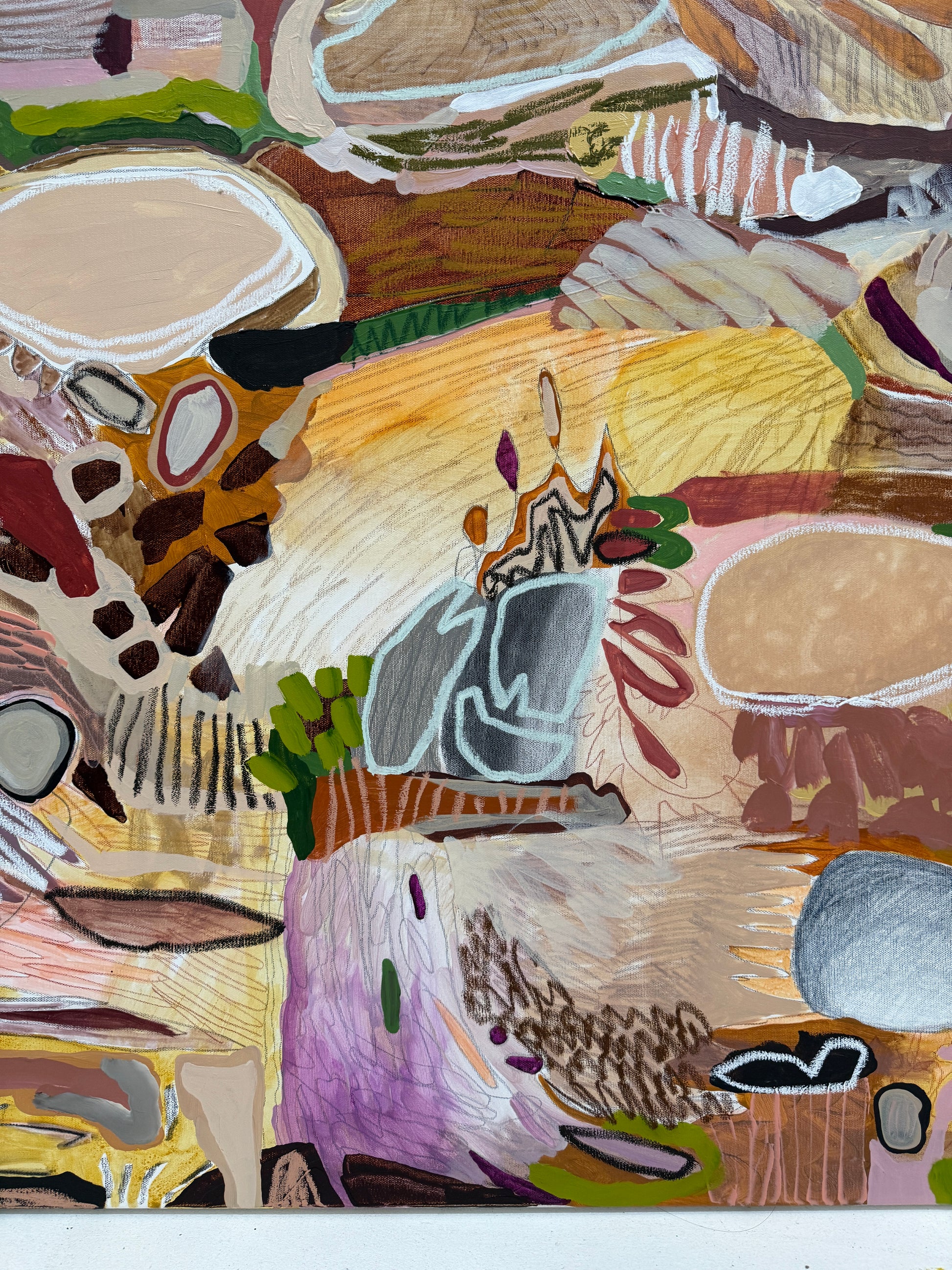 Abstract artwork with a mix of colors and shapes