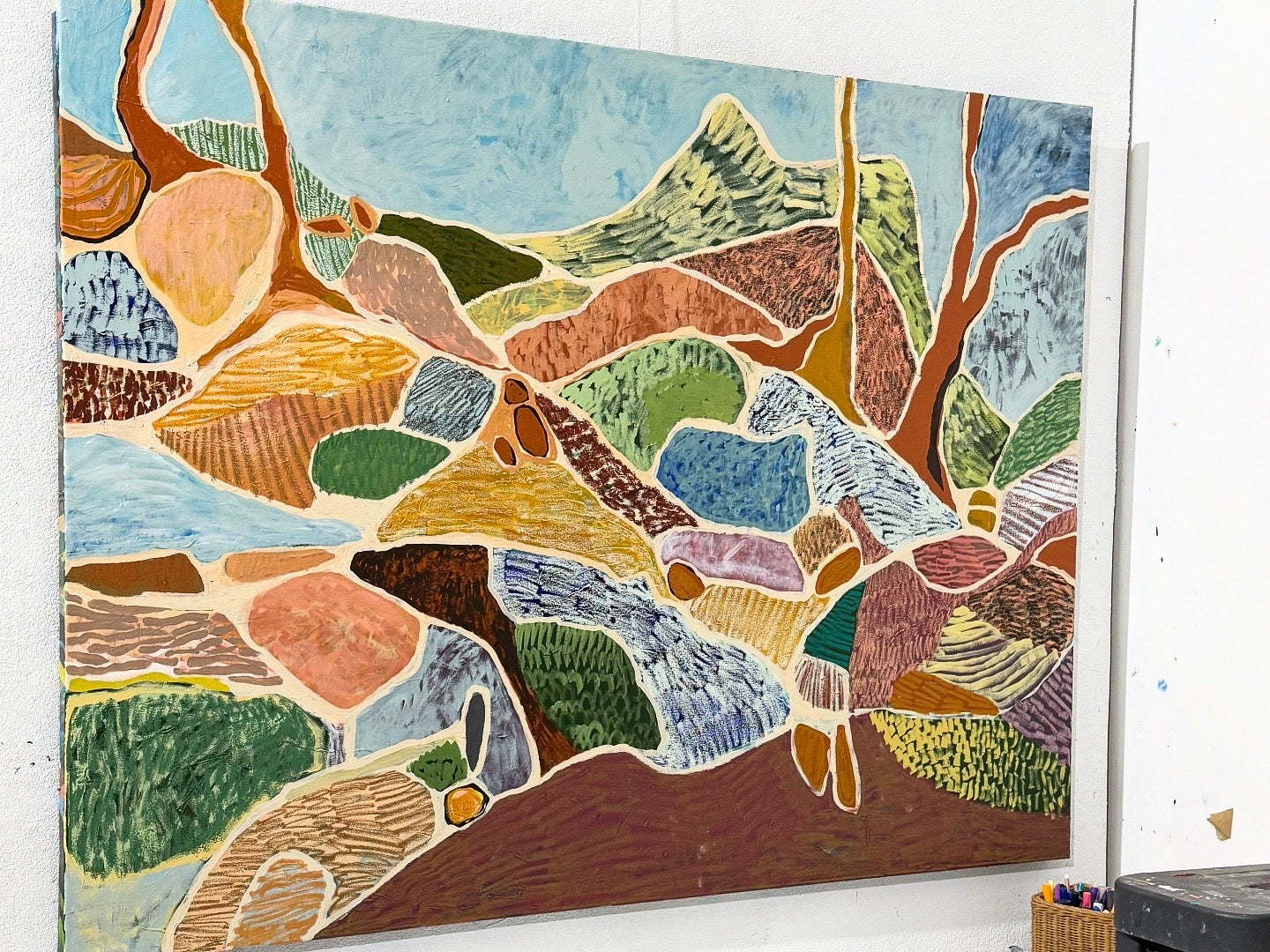 Colorful abstract painting on a white wall